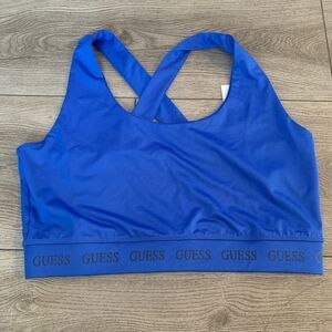 Guess woman’s sport bra with graphic design on bottom band